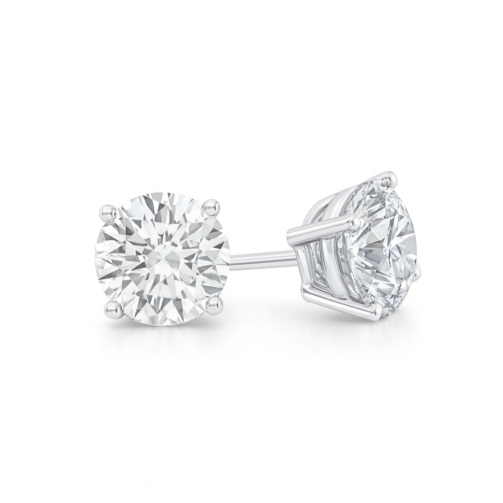 Pair of diamond stud earrings on a white background