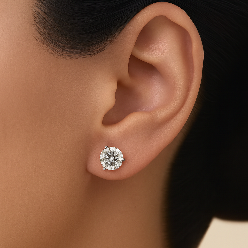 Close-up of an ear wearing a diamond stud earring with a blurred background