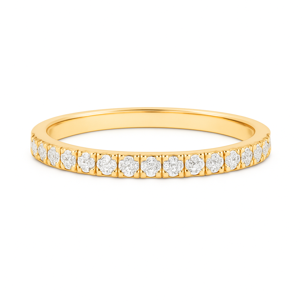 Gold ring with small diamonds on a white background