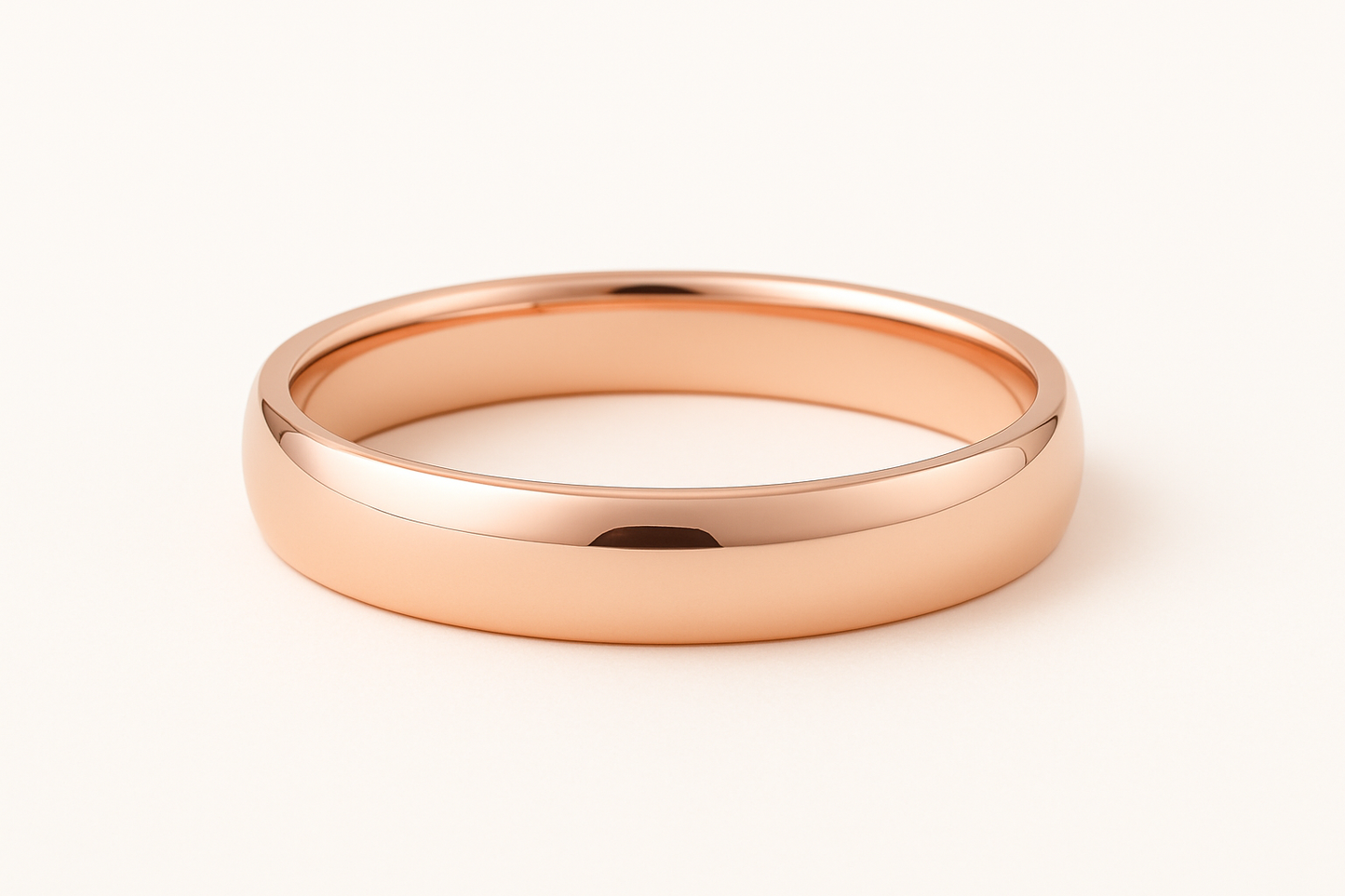Rose gold ring on a white background