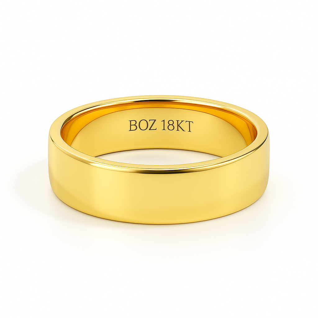 Gold ring with 'BOZ 18KT' engraving on a white background