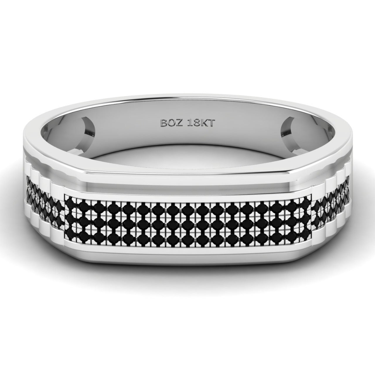 A gold band ring with black diamond pave pattern.