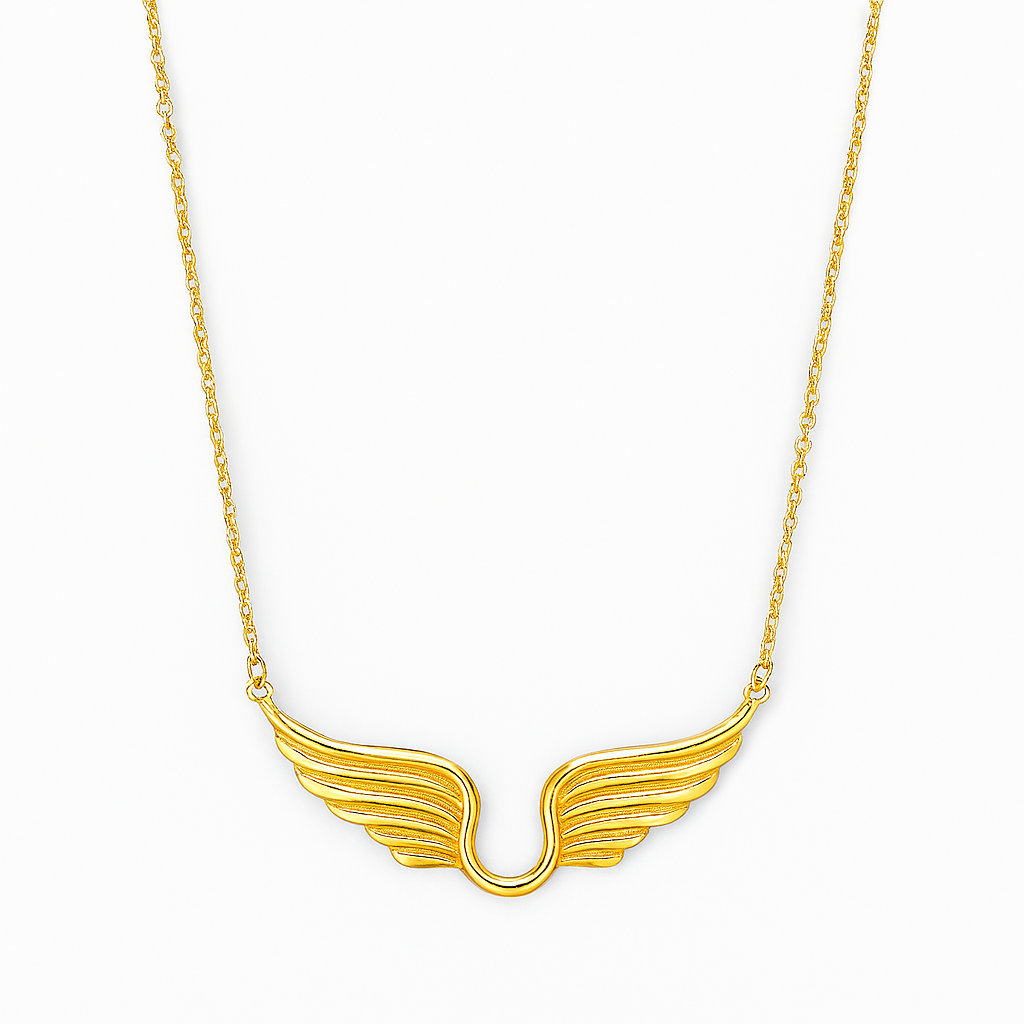 Gold wing-shaped necklace on a white background