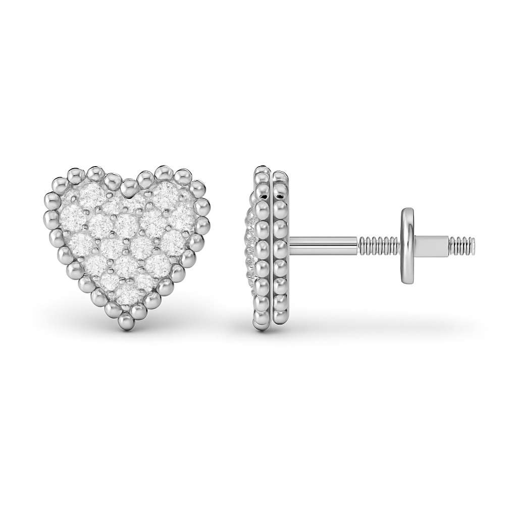 Heart-shaped silver earring with clear stones on a white background