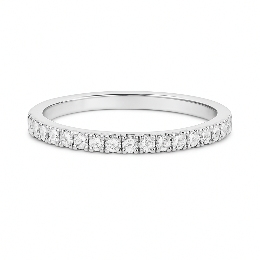 Silver ring with small diamonds on a white background