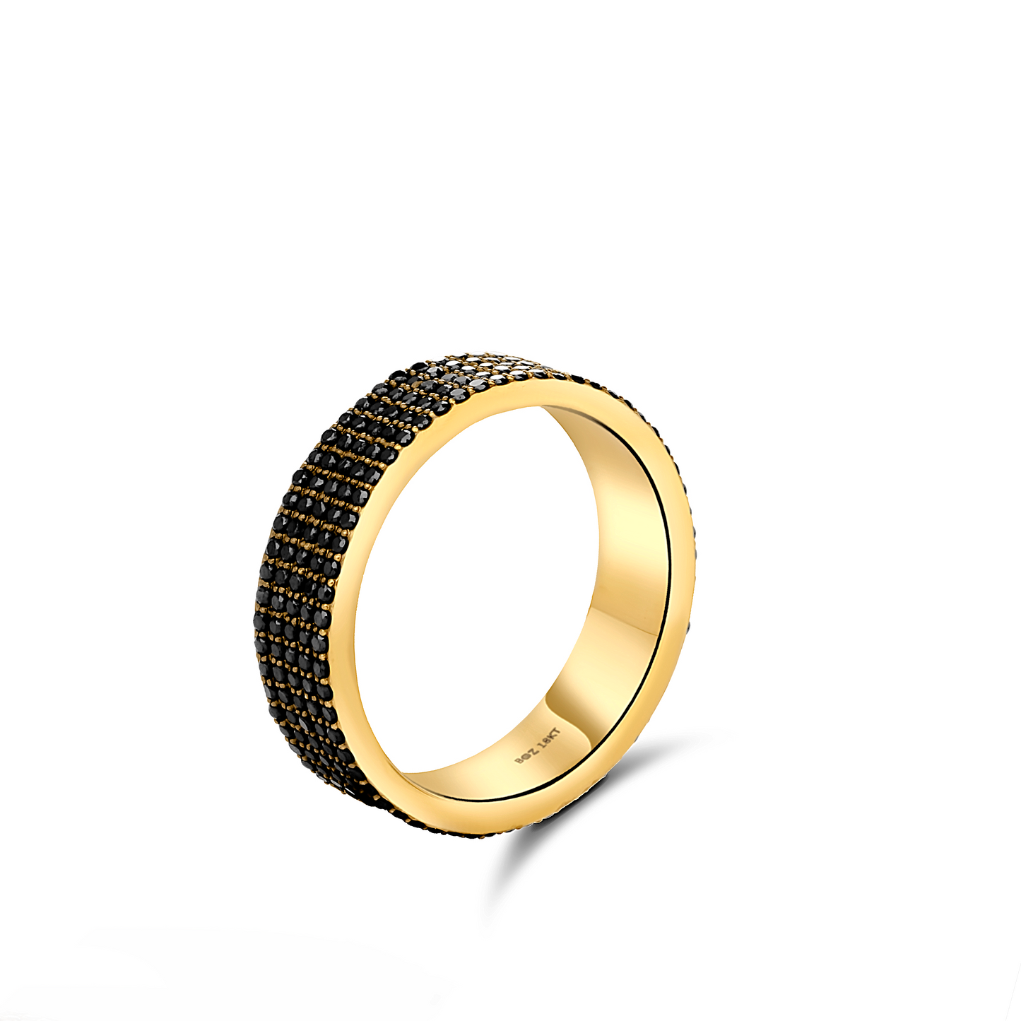 Gold ring with black gemstones on a white background
