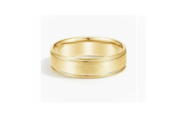Gold ring on a white background