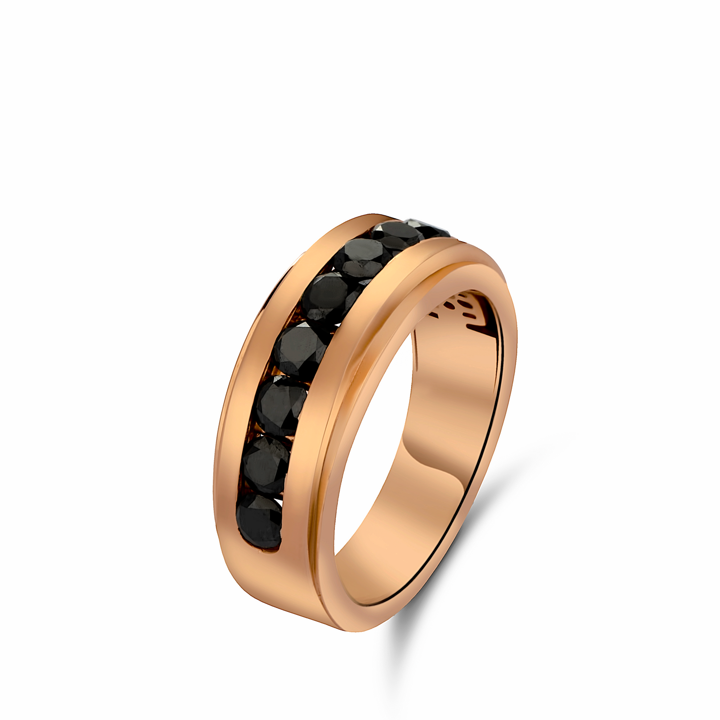 Rose gold ring with black gemstones on a white background
