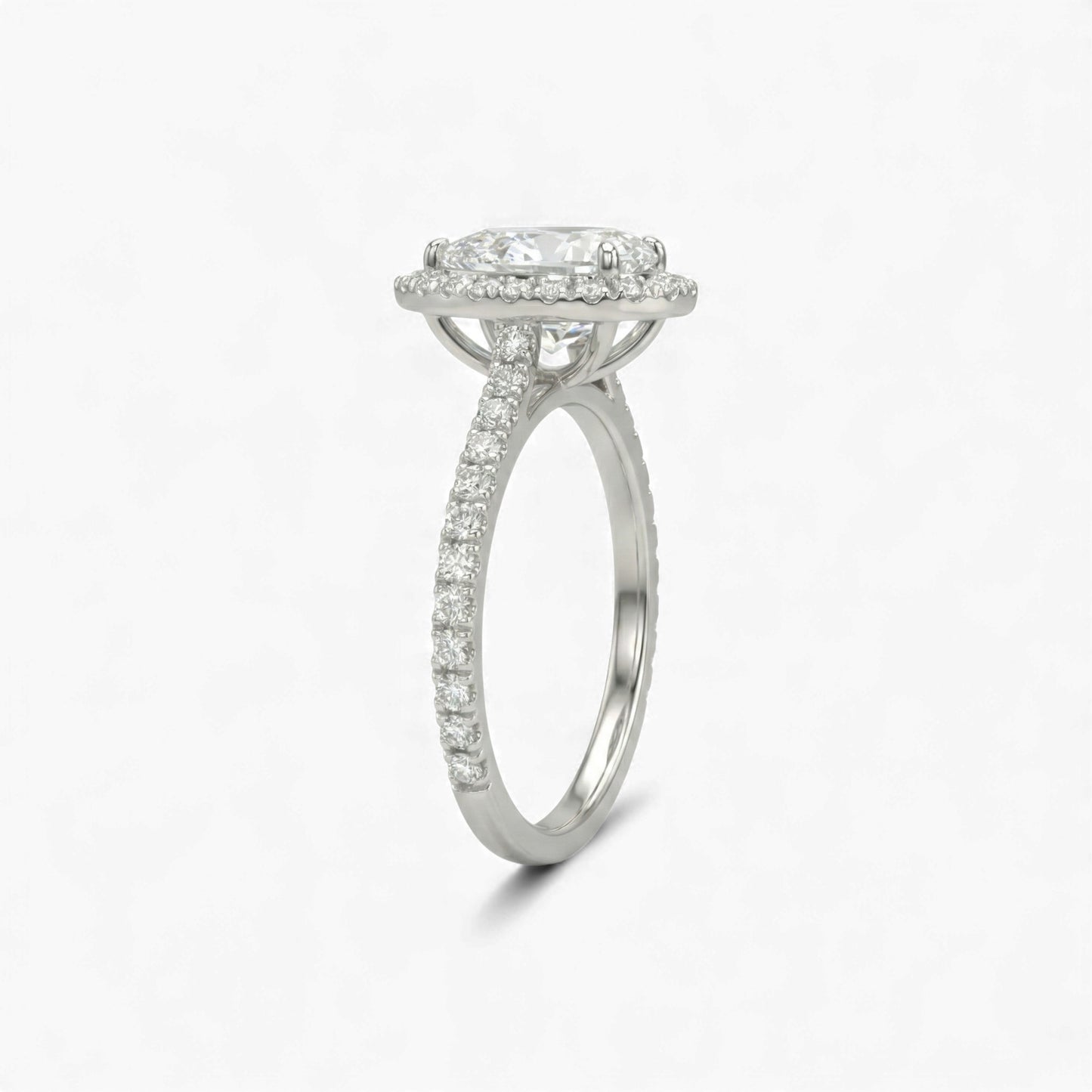 Silver ring with diamond accents on a white background