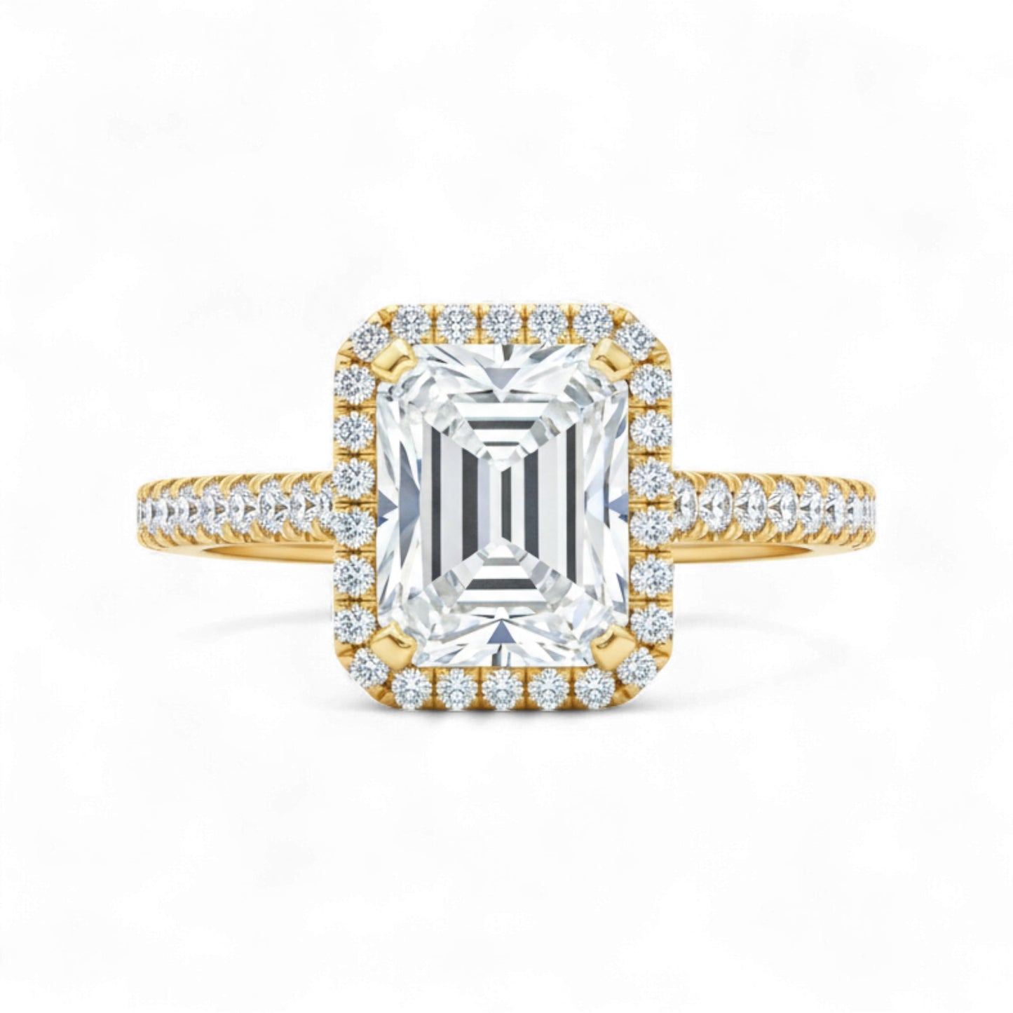 Gold and diamond ring with a large central gemstone on a white background