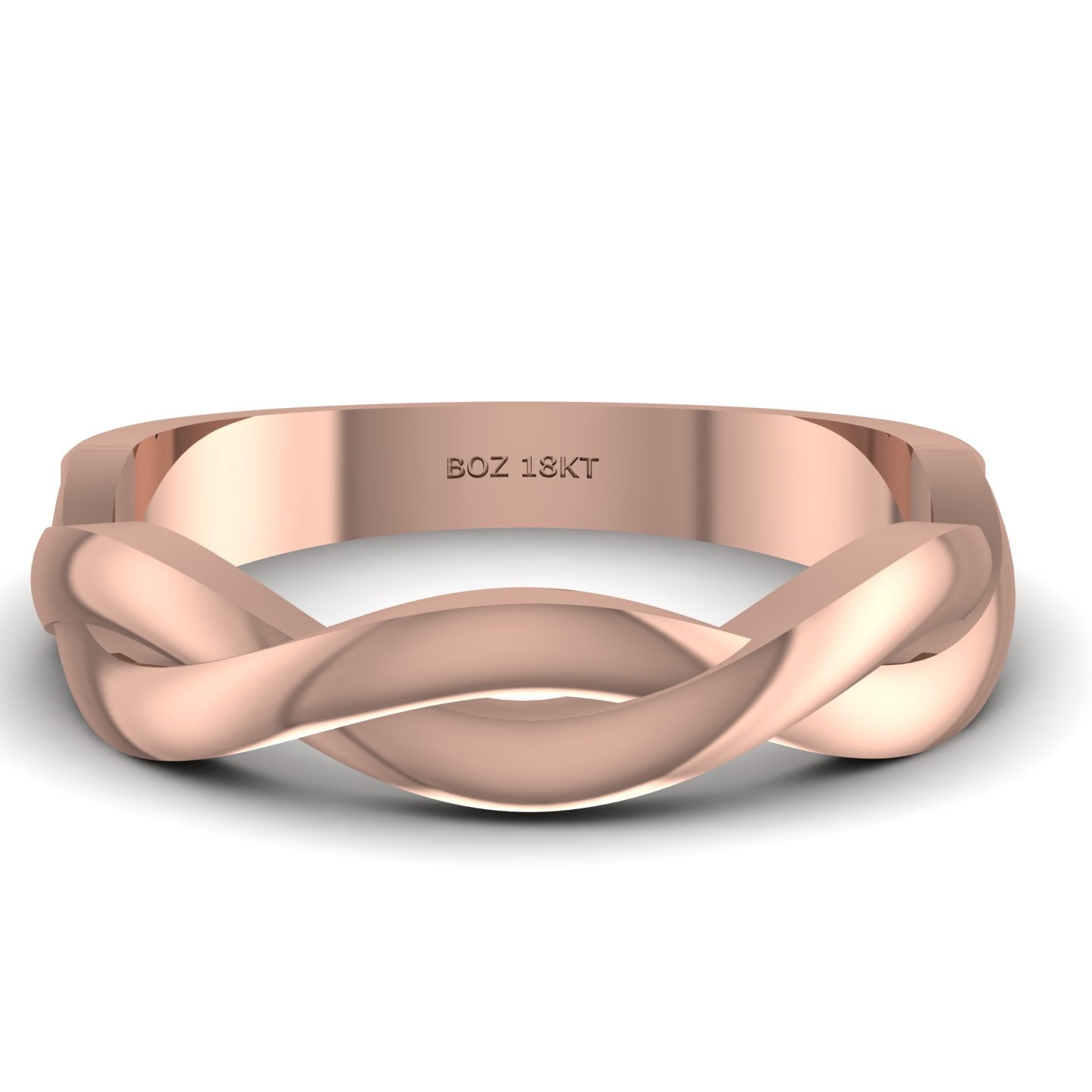 Rose gold ring with braided design on a white background