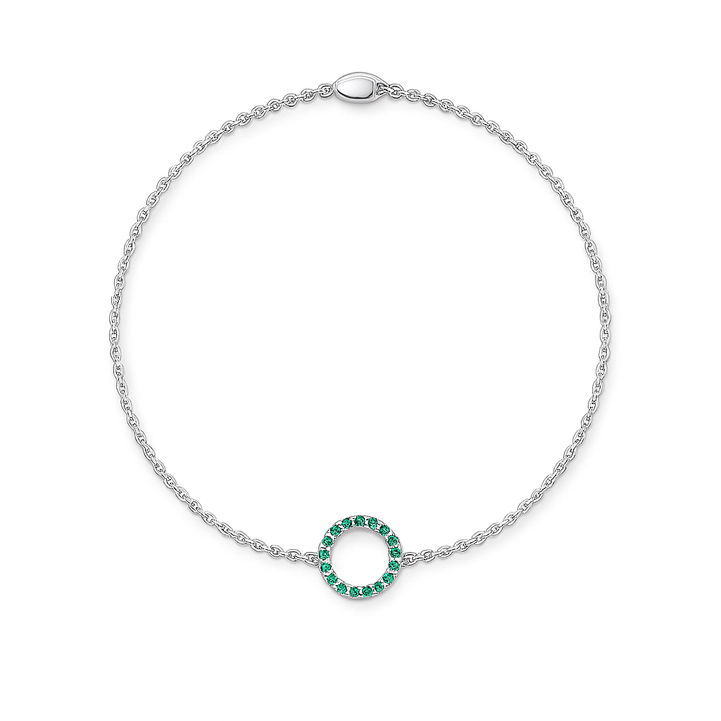 Silver bracelet with a green gemstone circle on a white background