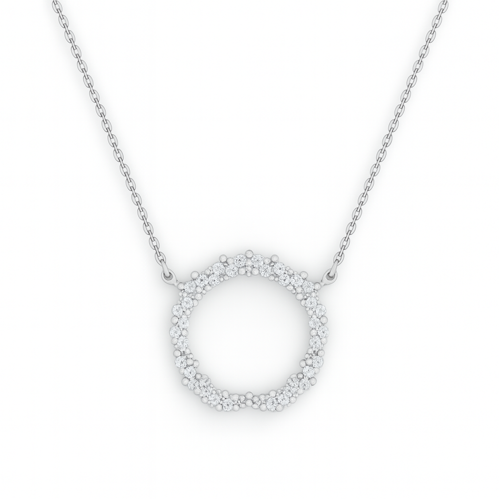 Silver necklace with a circular pendant on a white background