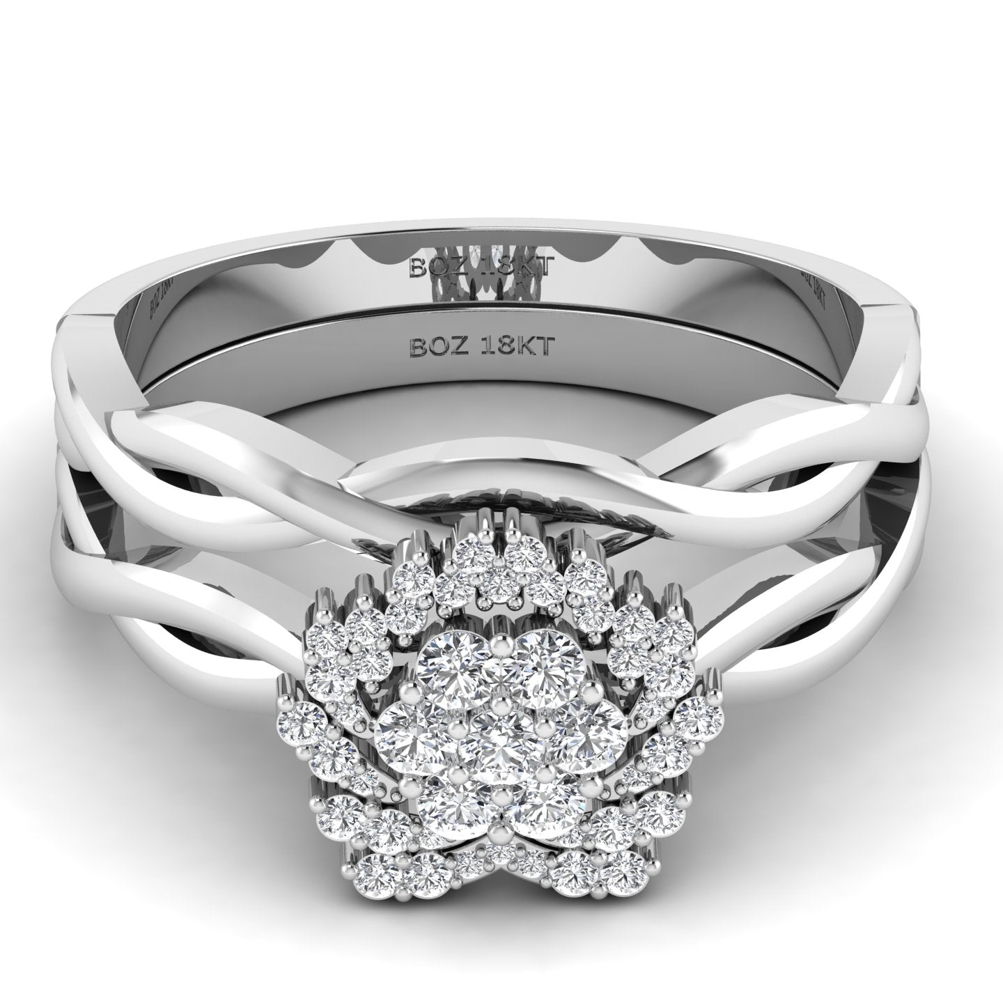 A set of two 18K gold rings with a central diamond ring, featuring a total of four bands with inset diamonds.