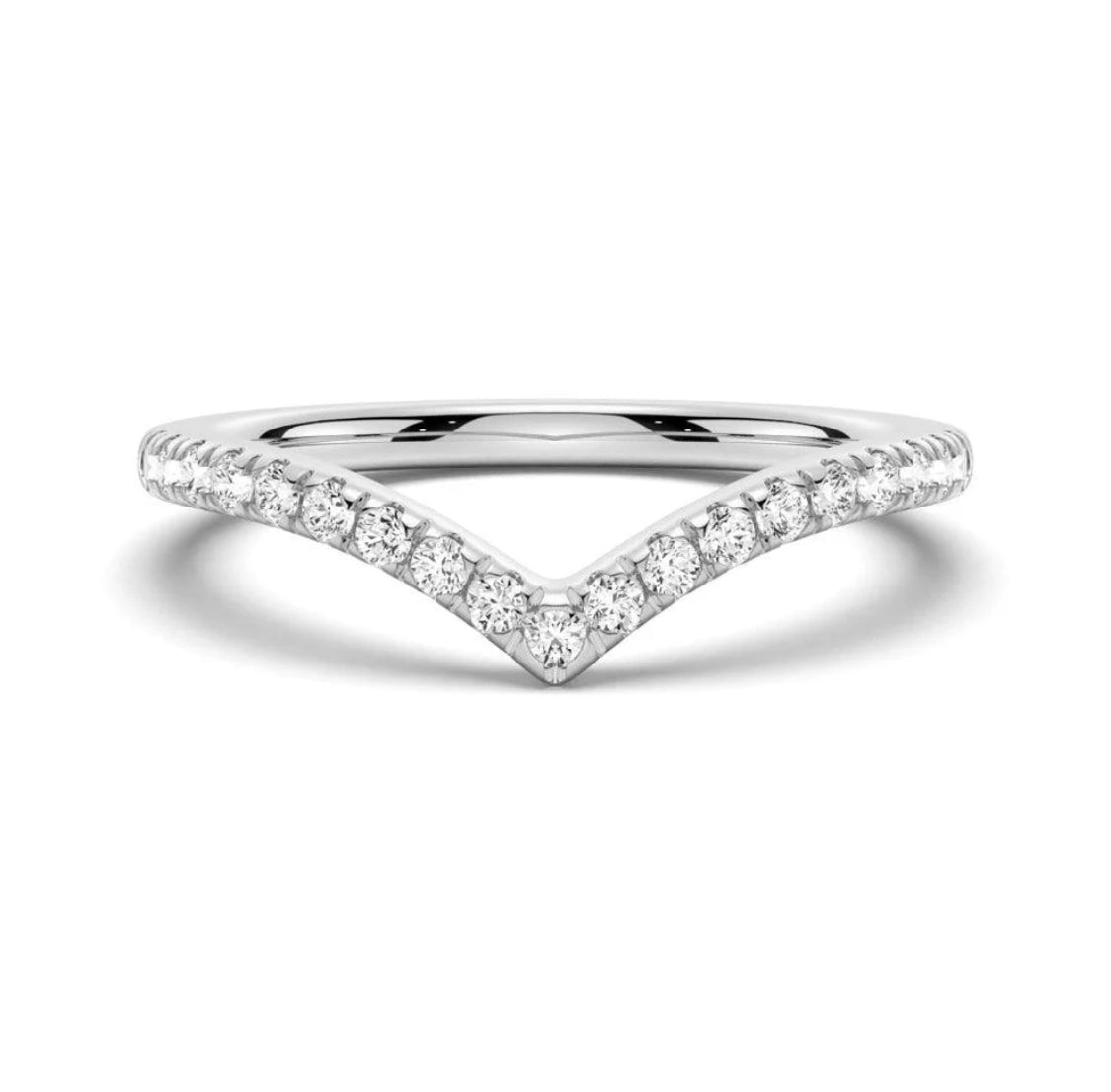 A curved 18K gold band with moissanite gemstones set in a V-shaped pattern on the top surface.
