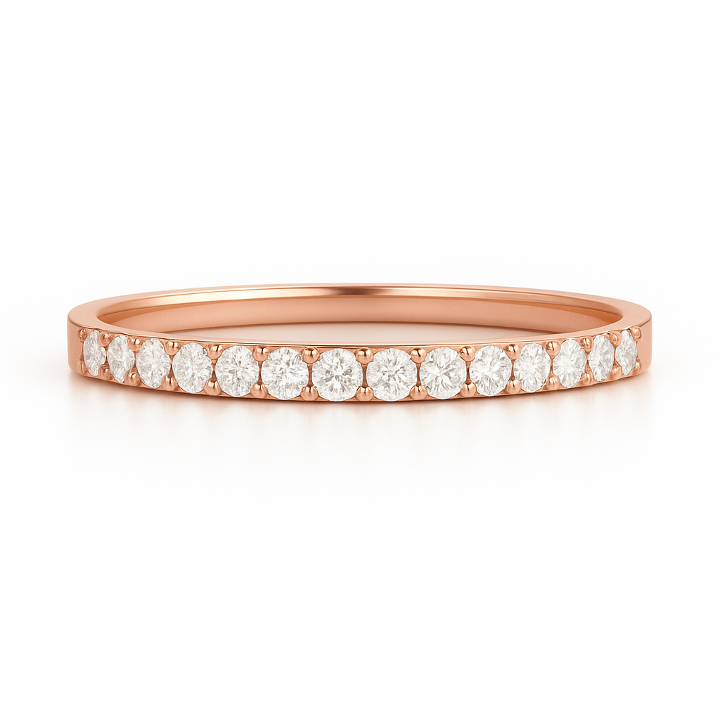 Rose gold ring with diamonds on a white background