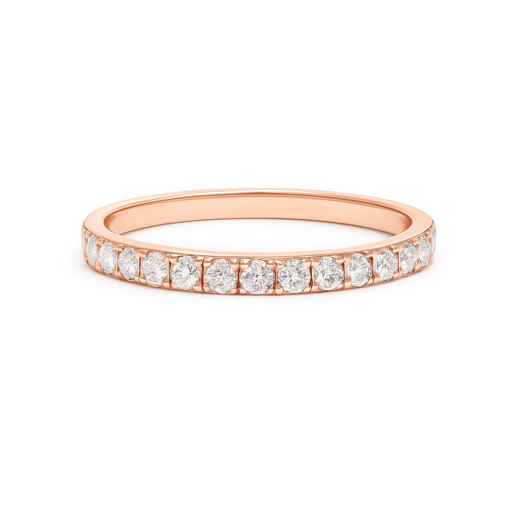 Rose gold ring with small diamonds on a white background