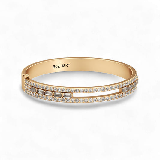 Gold bracelet with diamonds on a white background