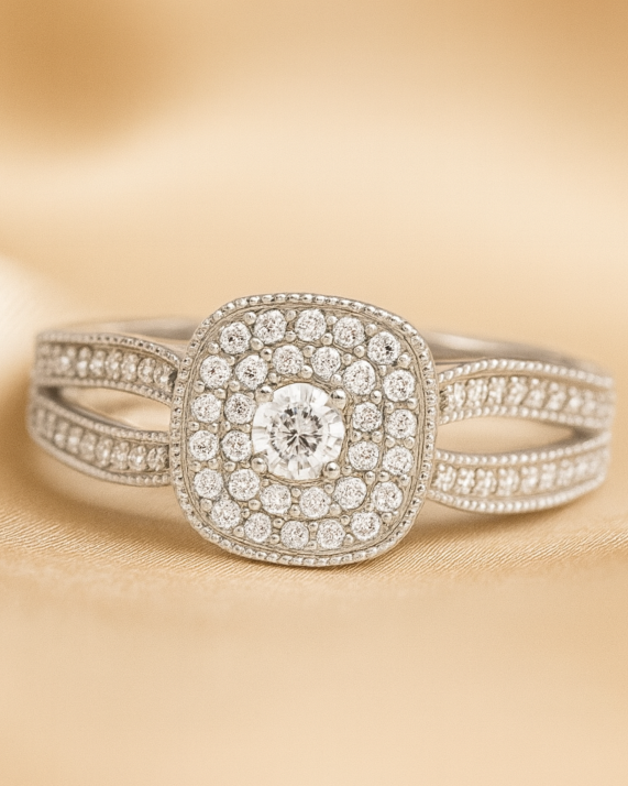 Silver ring with diamond accents on a beige background