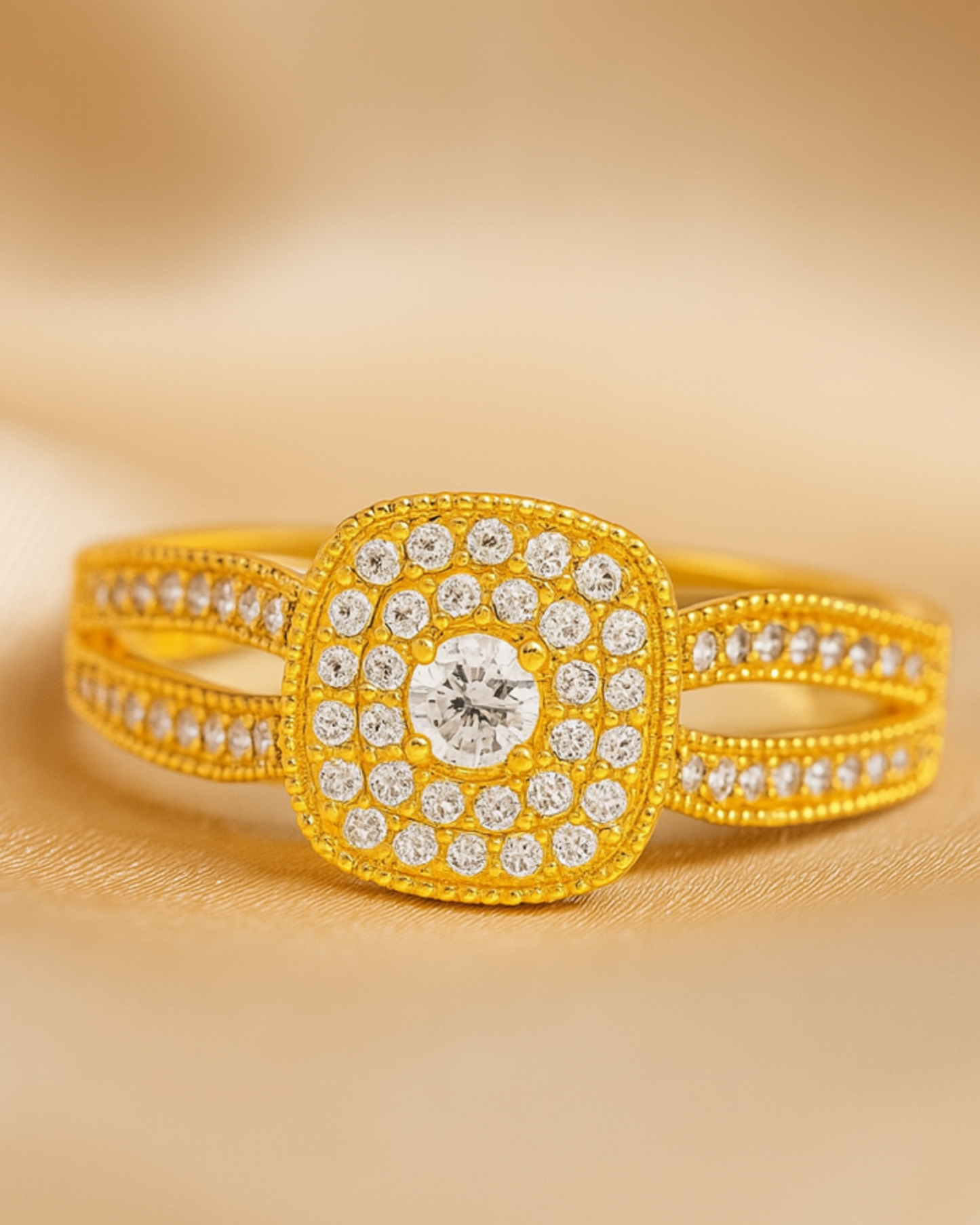 Gold ring with diamond accents on a gold background