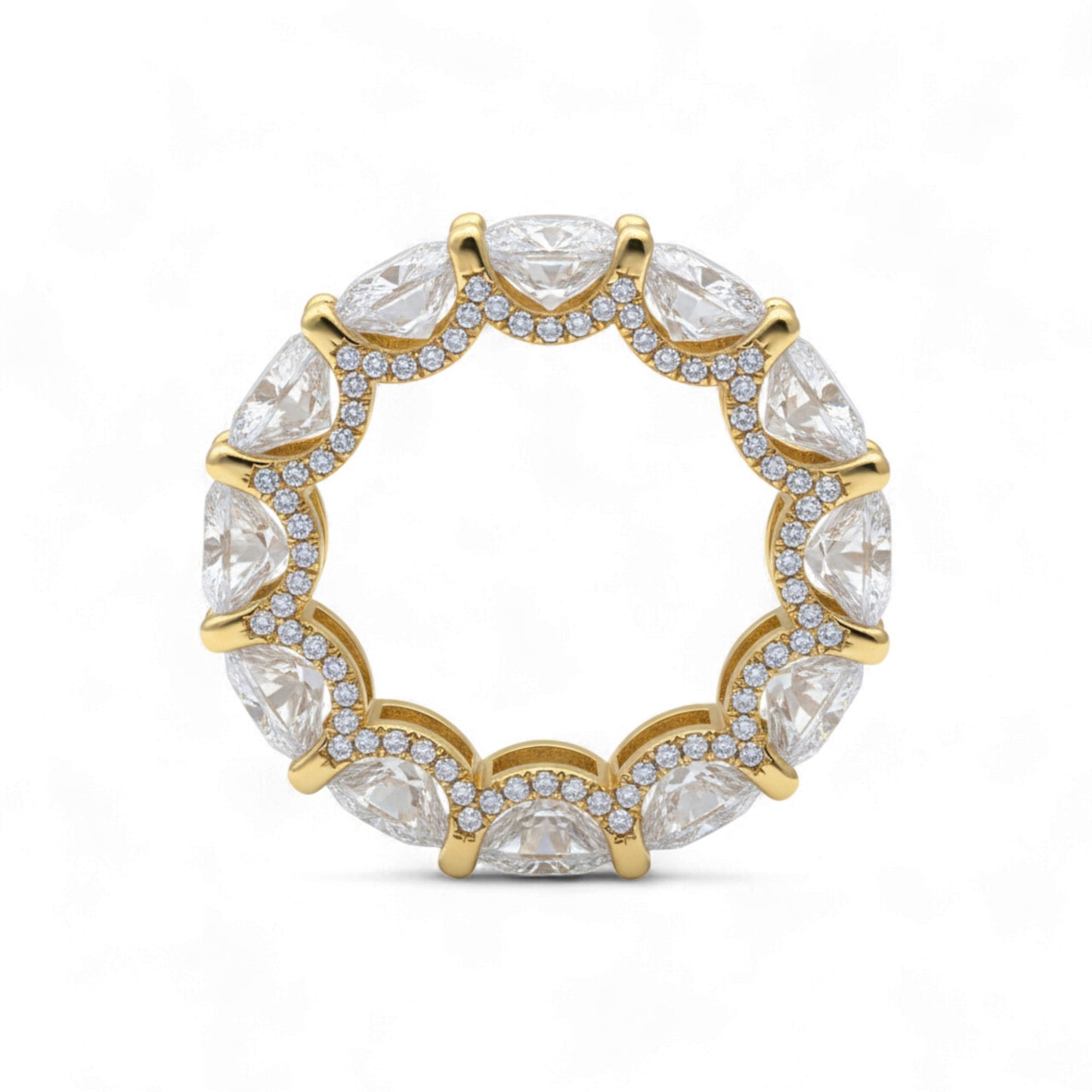 Gold ring with clear gemstones on a white background