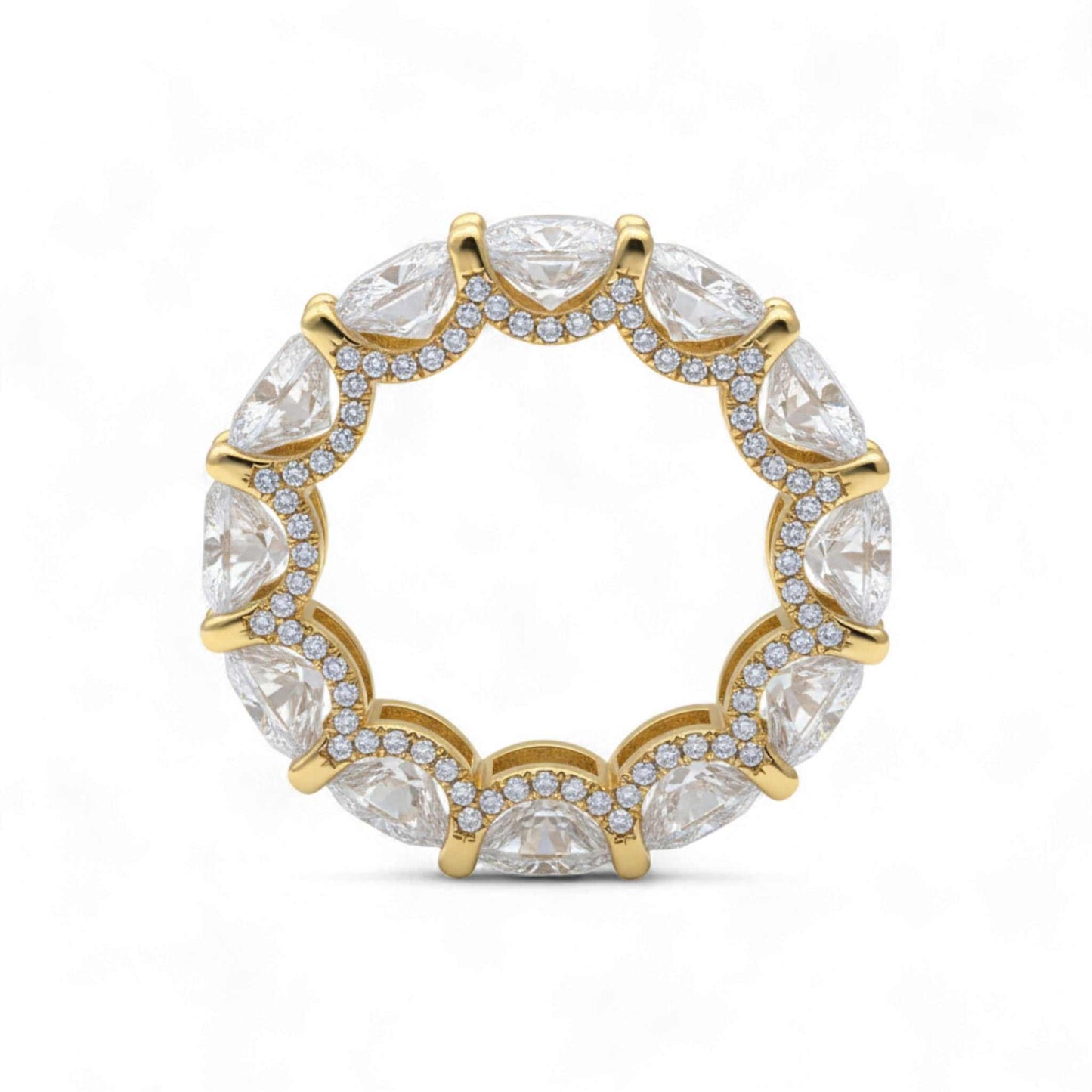 Gold ring with clear gemstones on a white background