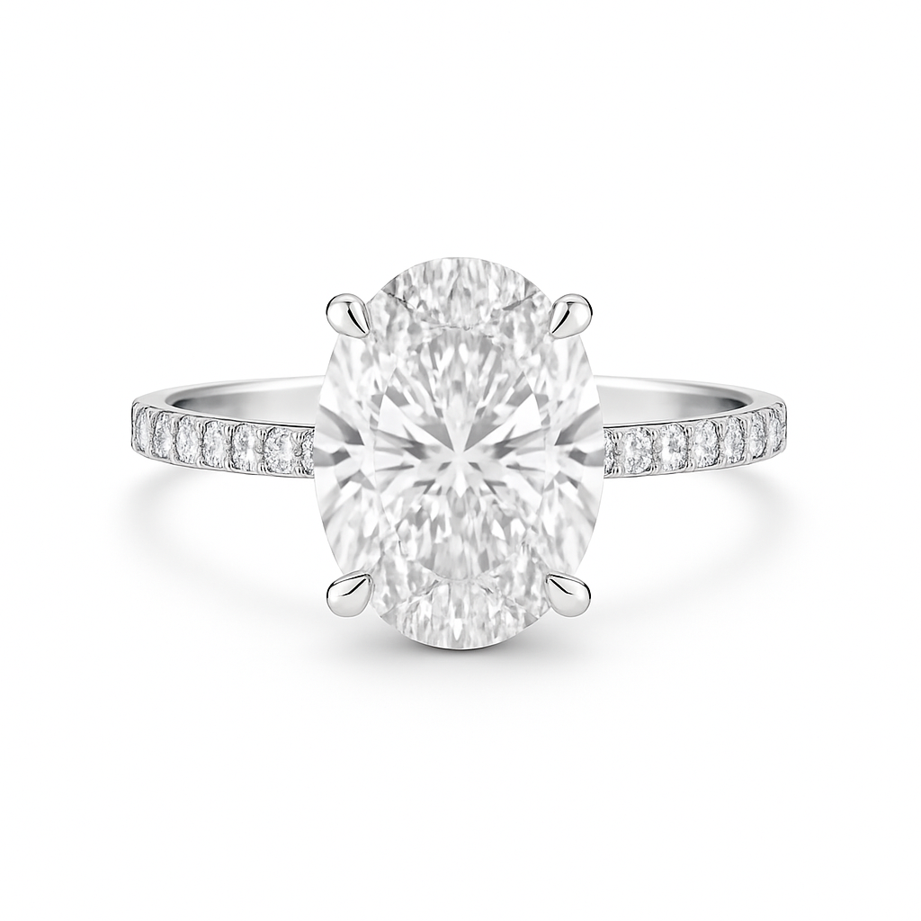 Diamond ring with a large central gemstone and smaller stones on the band against a white background