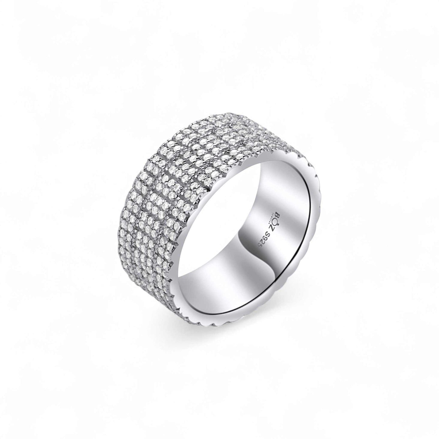 Silver ring with multiple rows of diamonds on a white background