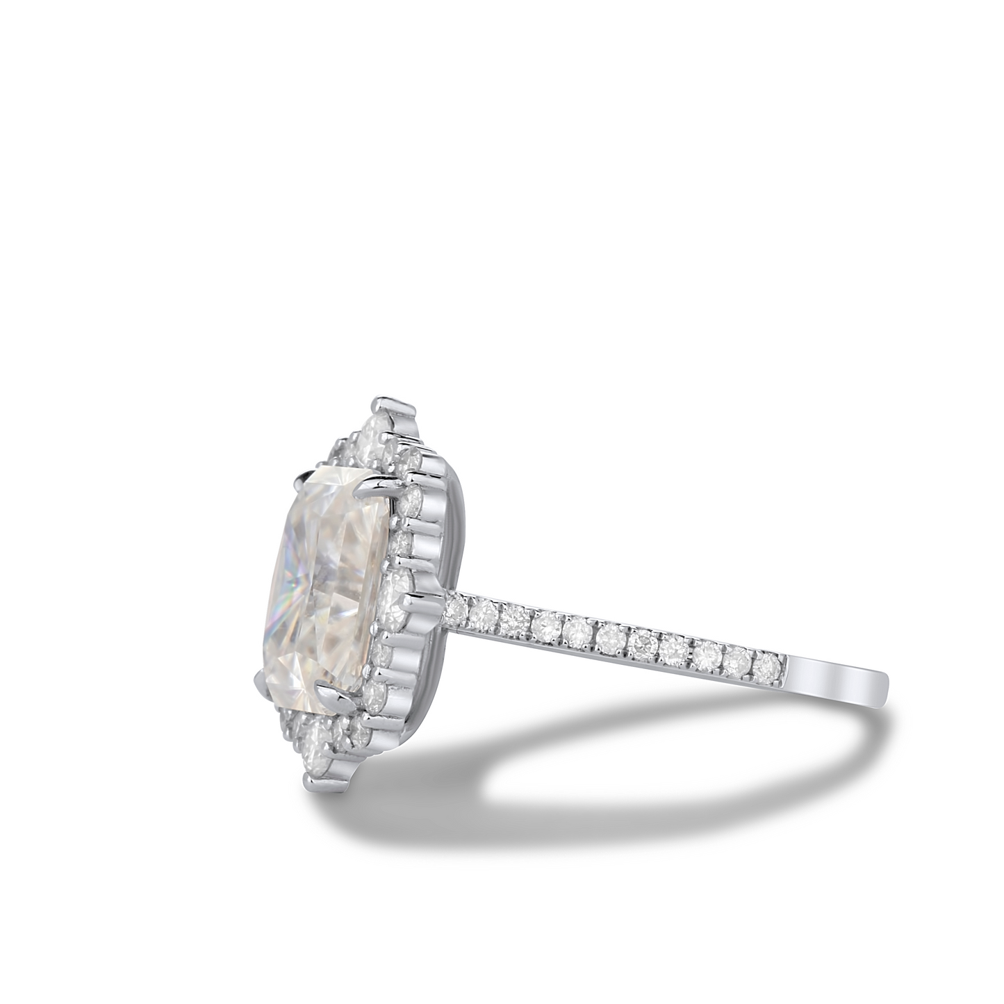 Diamond ring with a large central gemstone and smaller stones on a white background