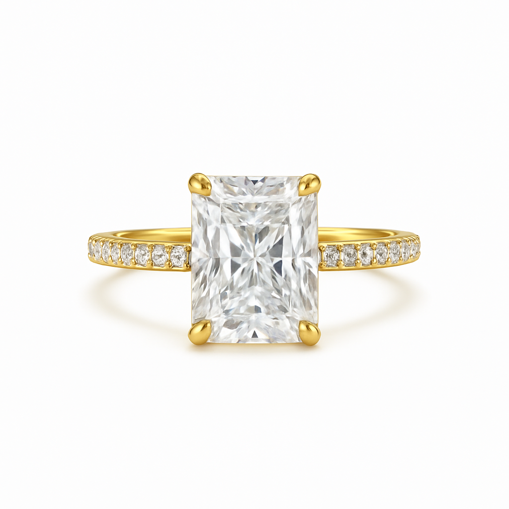 Gold ring with a large diamond and smaller diamonds on the band against a white background