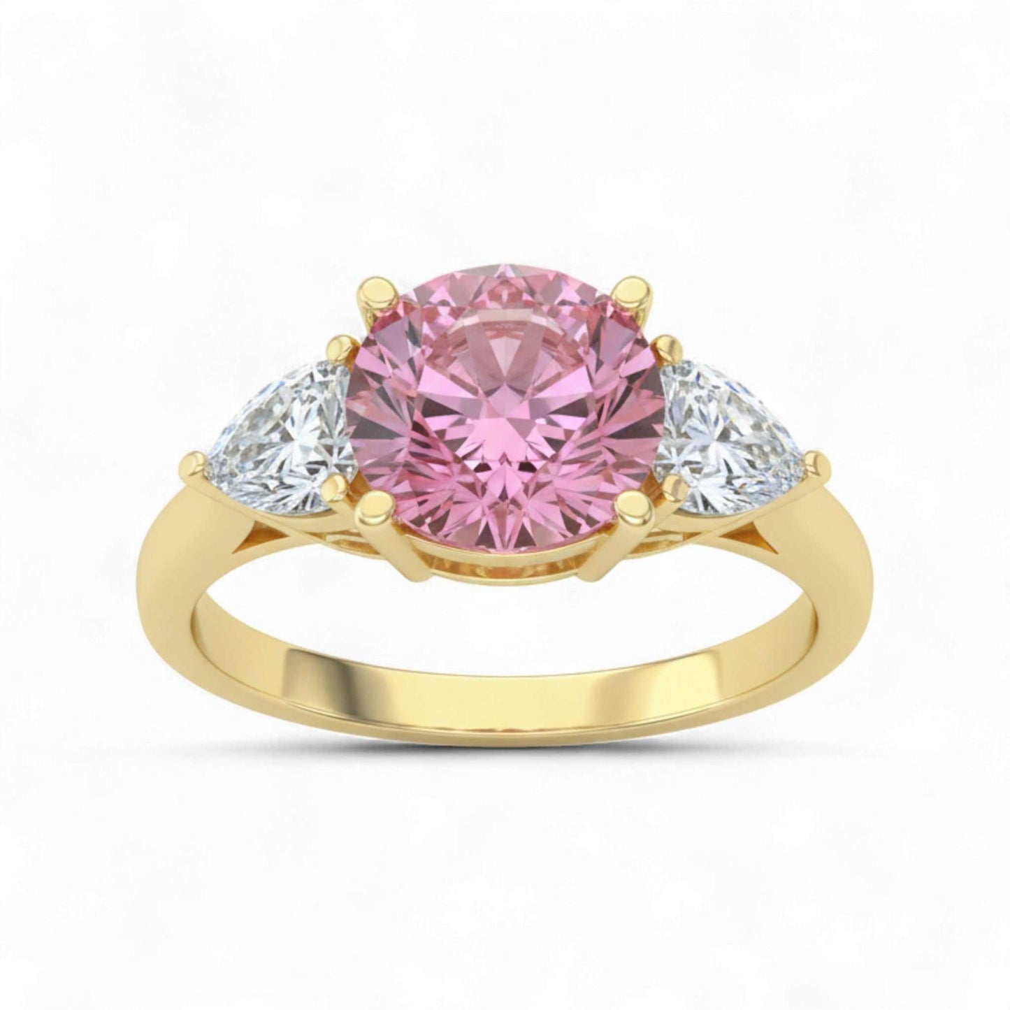 Trinity Pink Moissanite engagement ring with radiant pink center stone and two white side moissanites in 18KT gold band