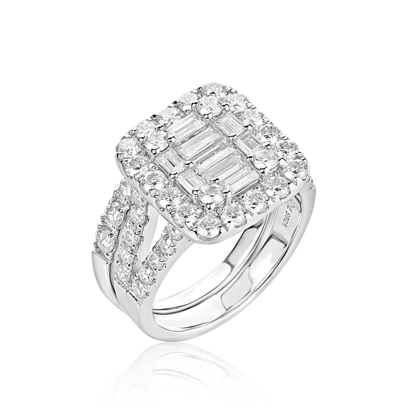Silver ring with clear gemstones on a white background