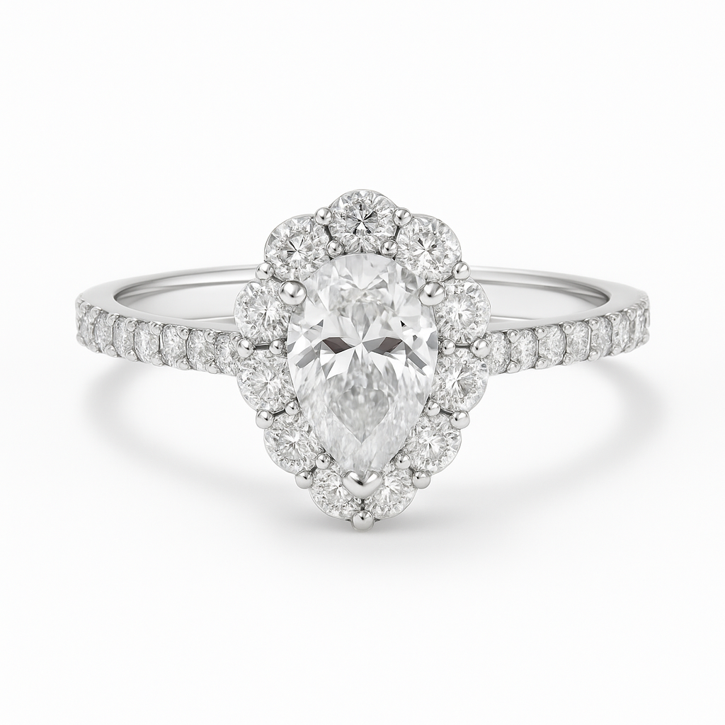 Diamond ring with a pear-shaped center stone on a white background