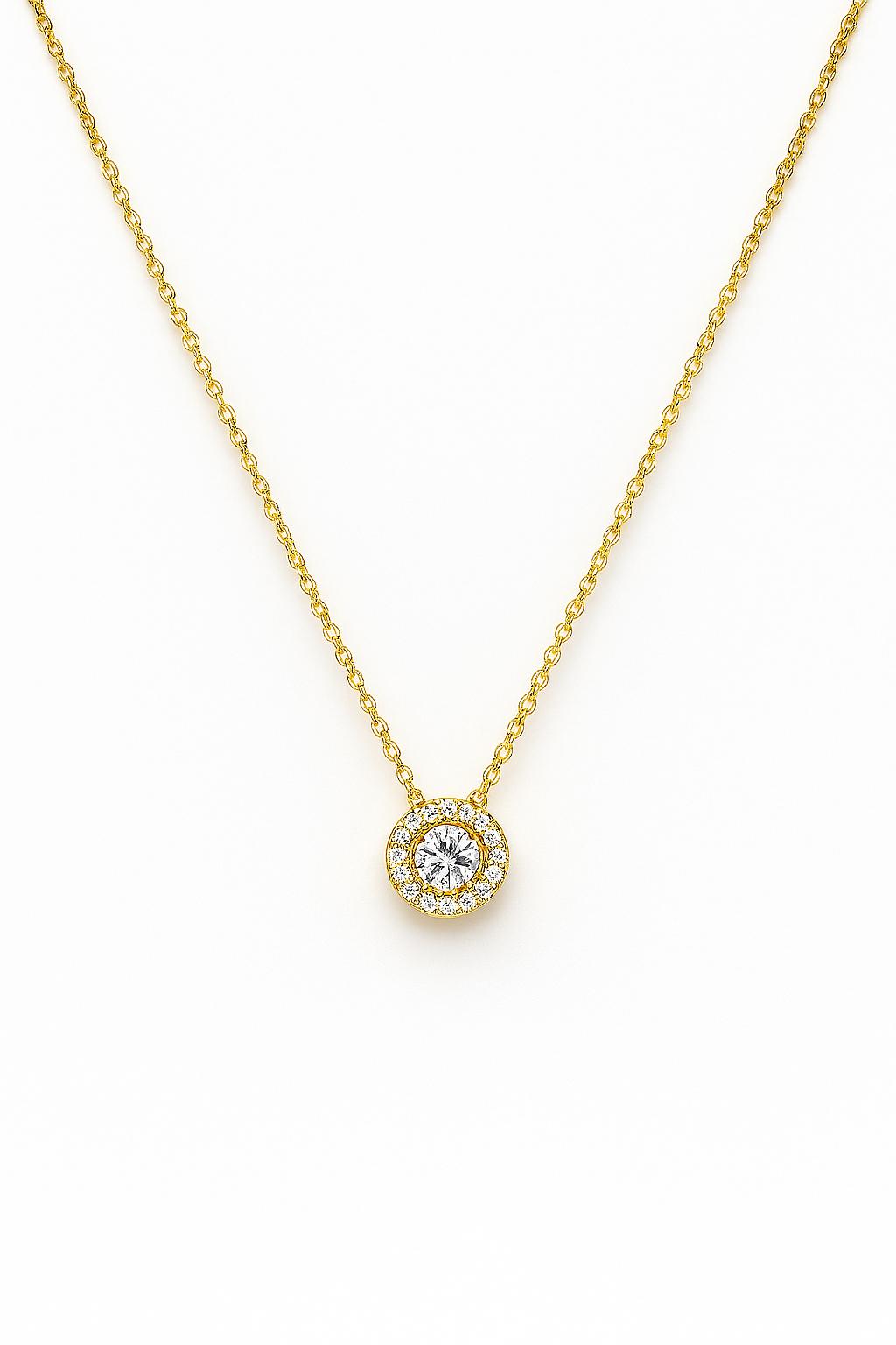 Gold necklace with a diamond pendant on a white background