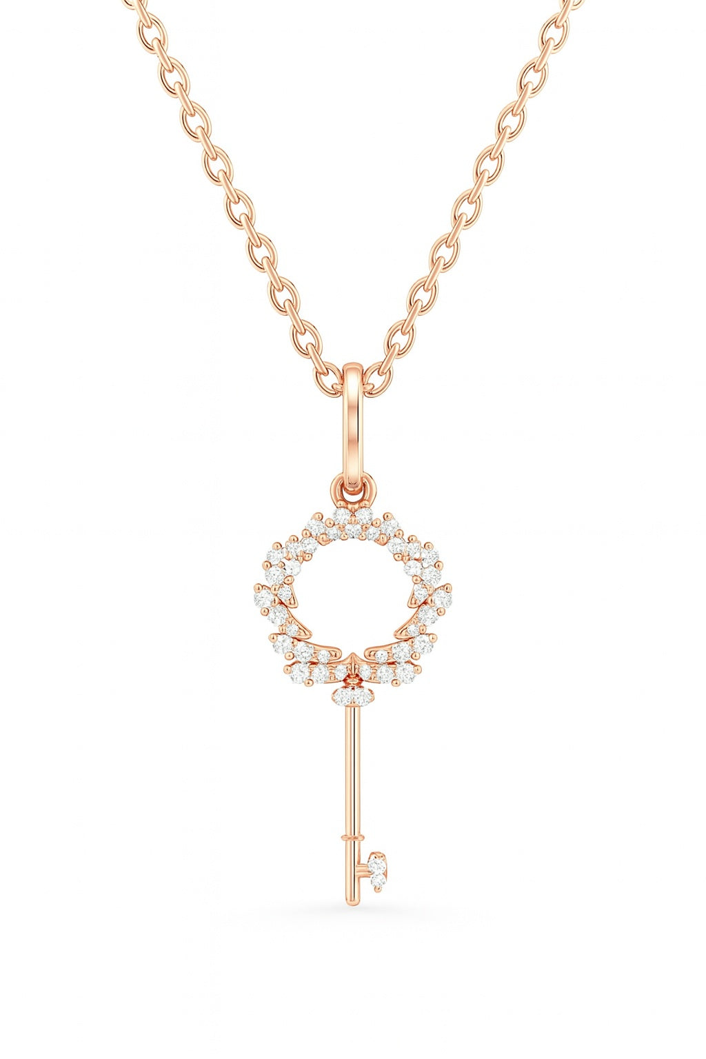 Rose gold key-shaped pendant necklace on a white background