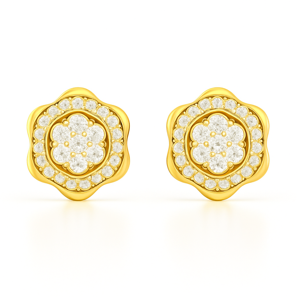 Gold earrings with diamond-like stones on a white background