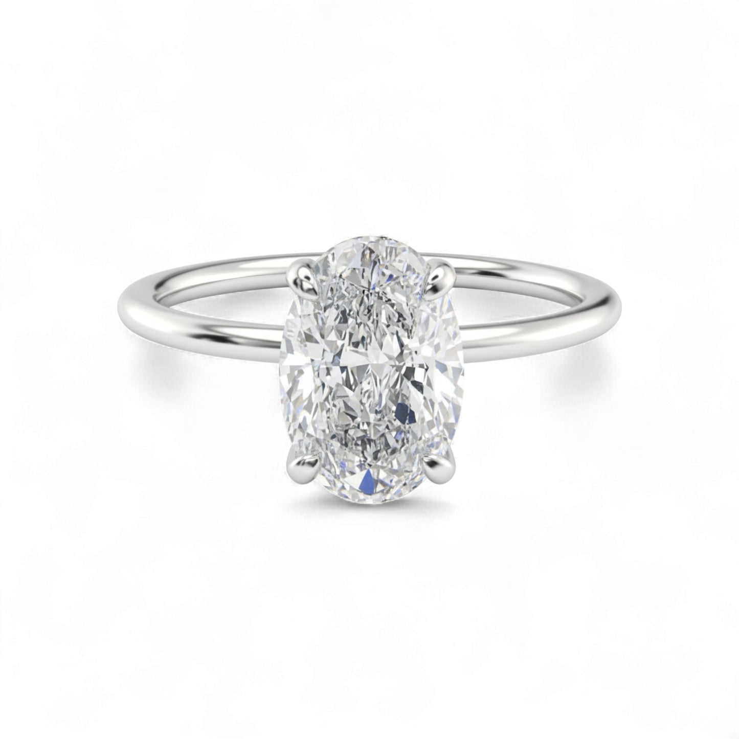 Diamond ring with a white gemstone on a white background