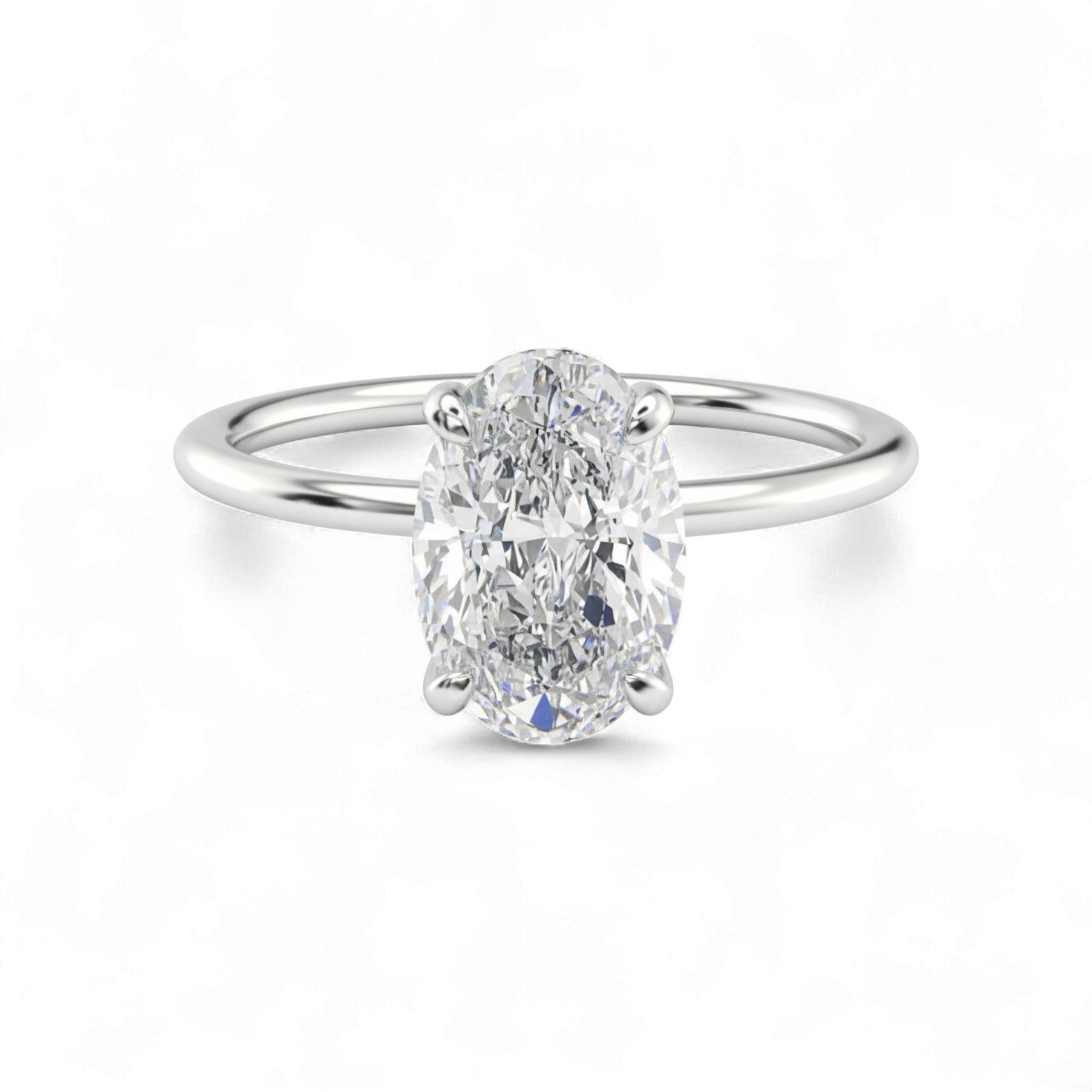 Diamond ring with a white gemstone on a white background