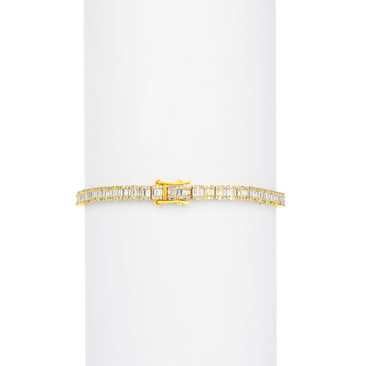 Gold bracelet with rectangular gemstones on a white background