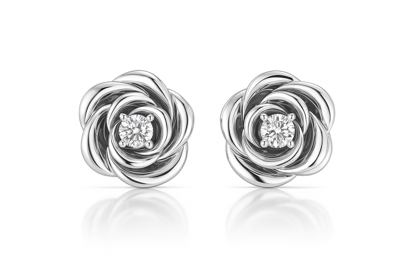 Silver knot earrings with embedded diamonds on a white background