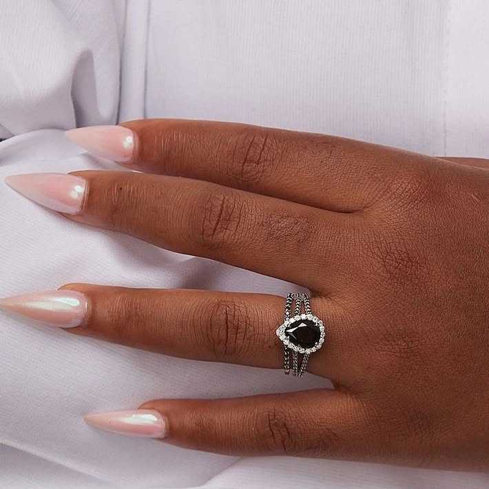 Black pear cut moissanite bridal ring set in 925 sterling silver on hand