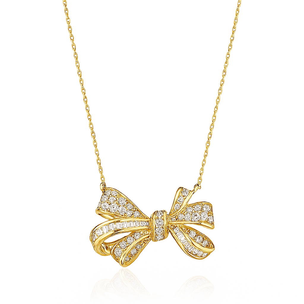 Gold bow-shaped necklace with diamonds on a white background