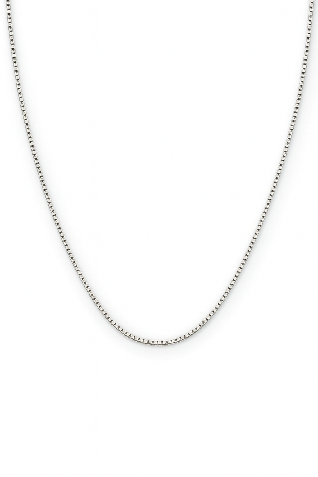 Silver chain necklace on a white background