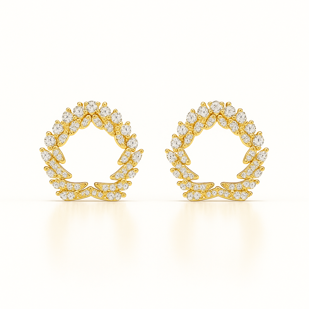 Gold earrings with diamond-like stones on a white background