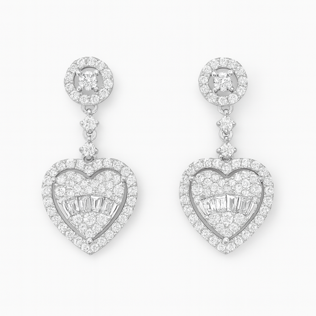 Heart-shaped diamond earrings on a white background