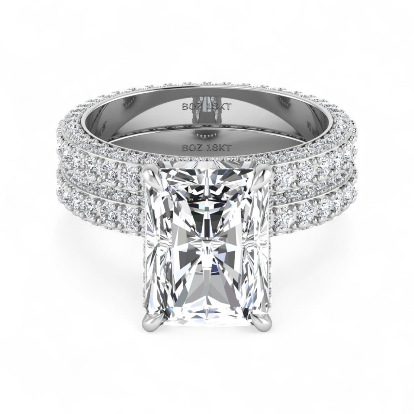Diamond ring with a large central gemstone and smaller stones on a white background