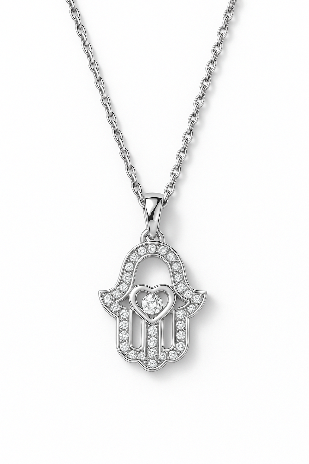 Silver Hamsa hand pendant necklace with heart detail on a white background