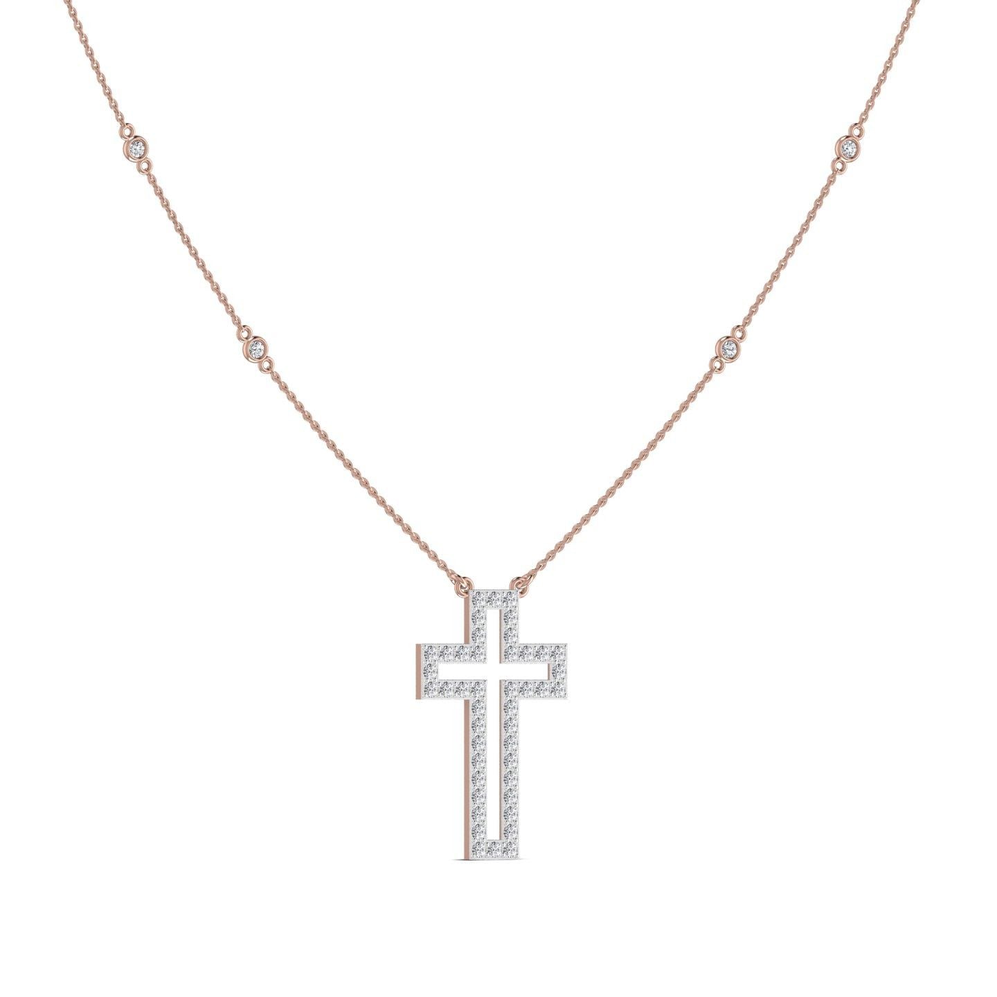 Rose gold cross necklace with diamonds on a white background