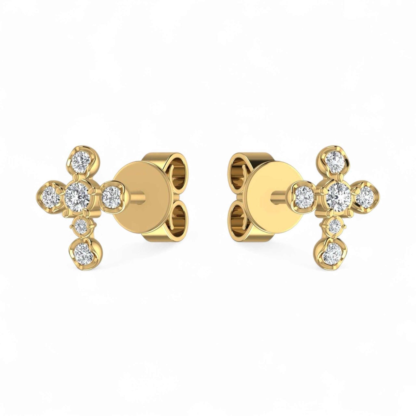 Gold cross-shaped earrings with diamond-like stones on a white background