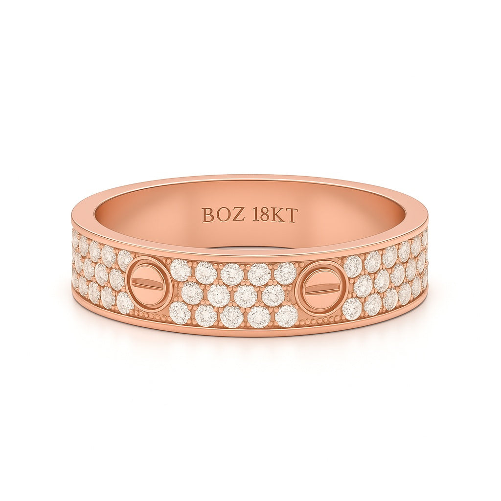 Rose gold ring with diamonds and 'BOZ 18KT' engraving on a white background